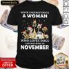 Nice Never Underestimate A Woman Who Loves Dogs And Was Born In August Christmas Shirt